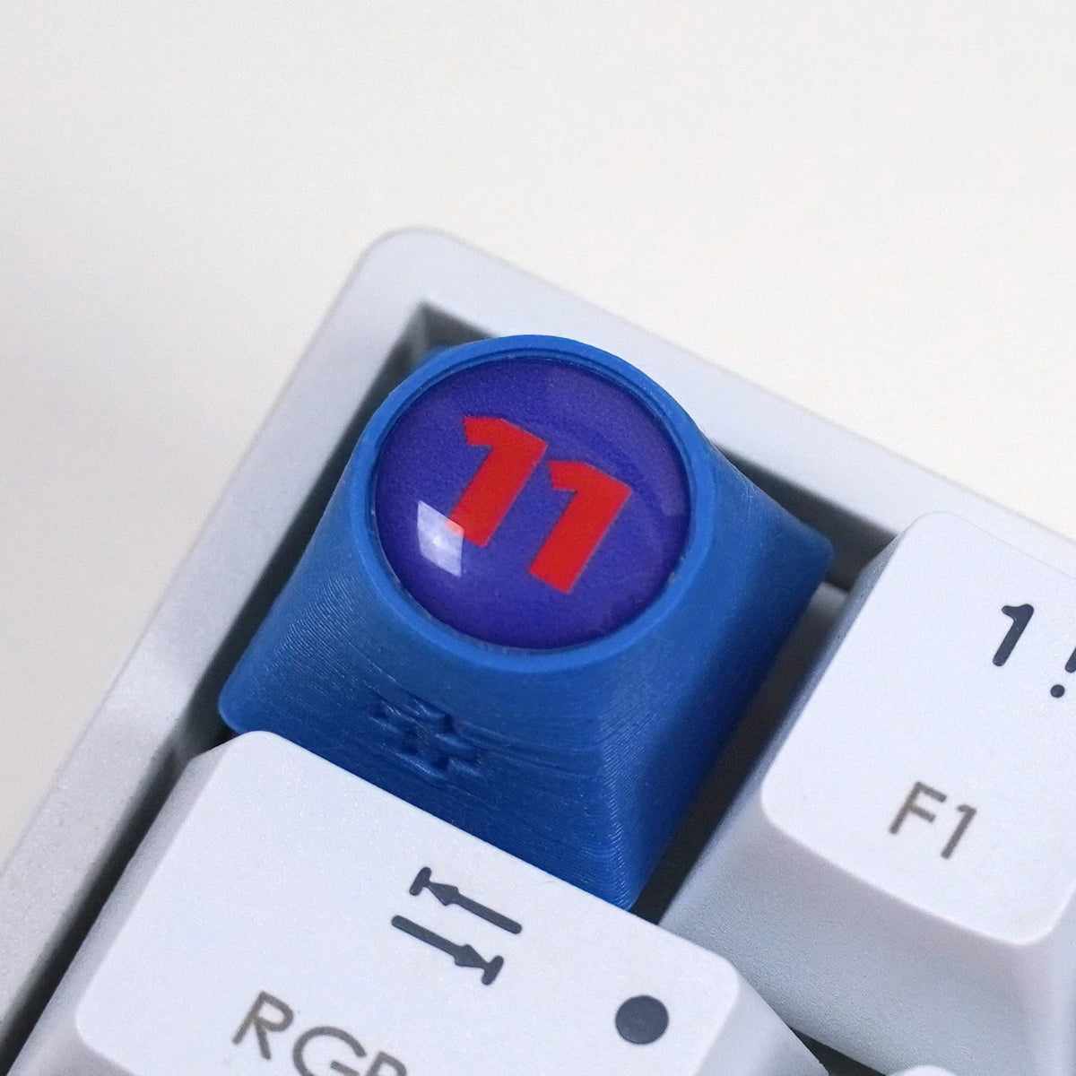 Artisan F1 – PER + NR. 11 keycap
