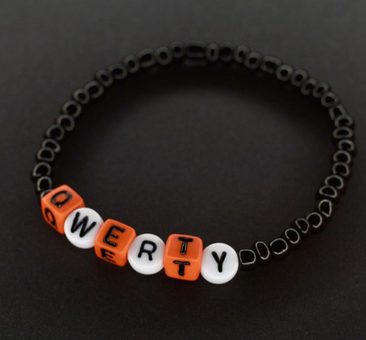 QwertyKey x Bold Persons karkötő
