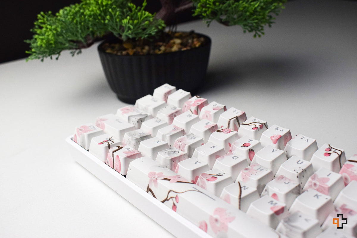 Sakura áttetsző OEM profilú ABS double-shot keycap szett